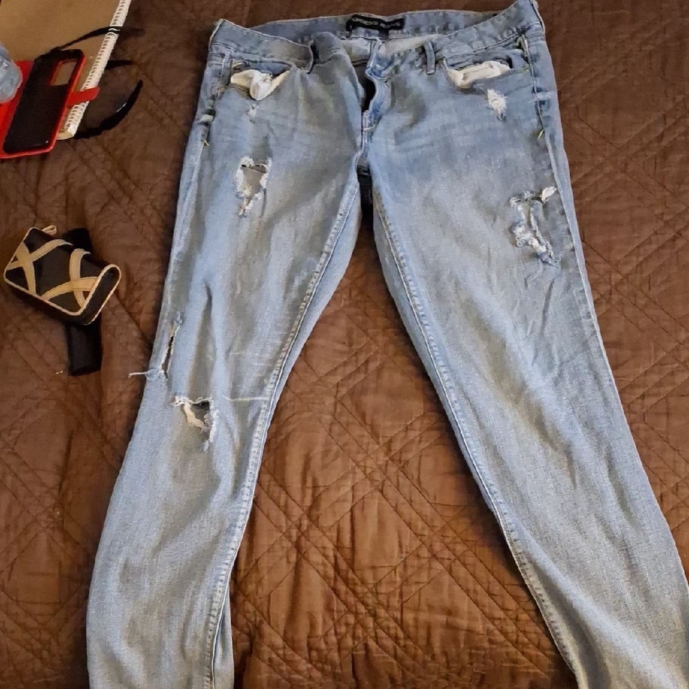 Women's Distressed Blue Jeans